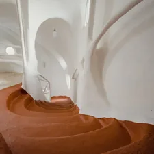 a person's foot in a room related to Climb Toasty Warmth: Terracotta Chiminea at Lowe's