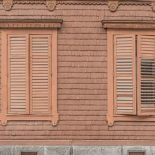 a red brick building with two windows and a bench related to Wooden Valances for Windows | Best Designs and Ideas