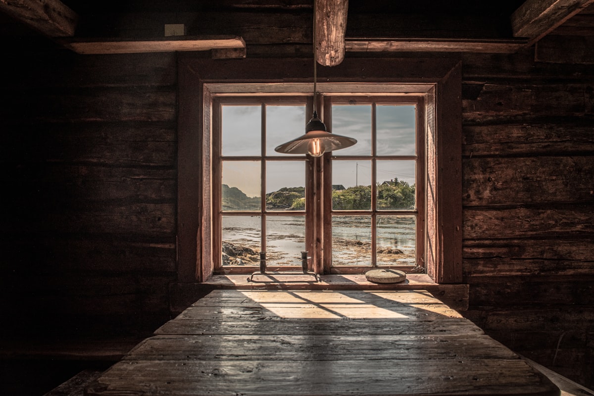 a room with a large window related to Define a Rustic Atmosphere