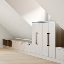 A room with a lot of cabinets in it related to Unlocking Space Efficiency with Murphy Bed Cabinets