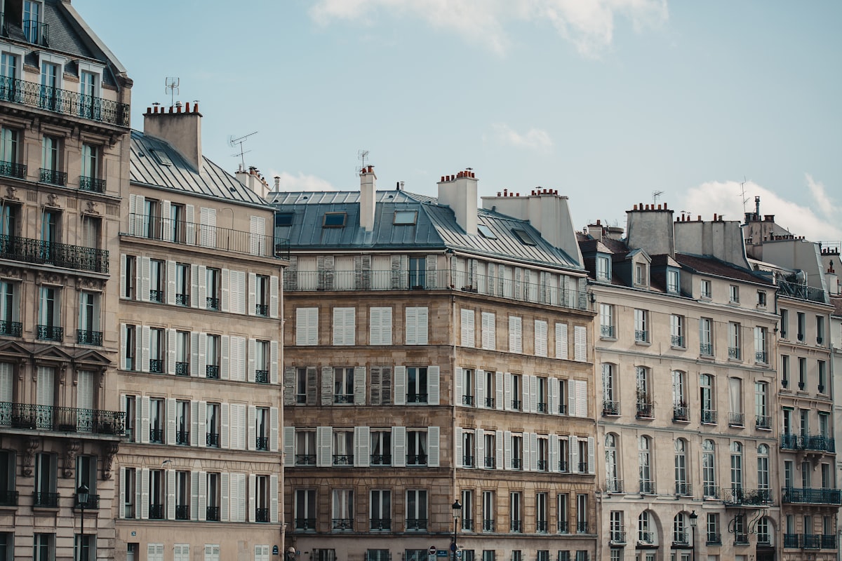 a row of buildings with balconies and windows related to Discover the Elegance and Comfort of Paris Twin Bedding