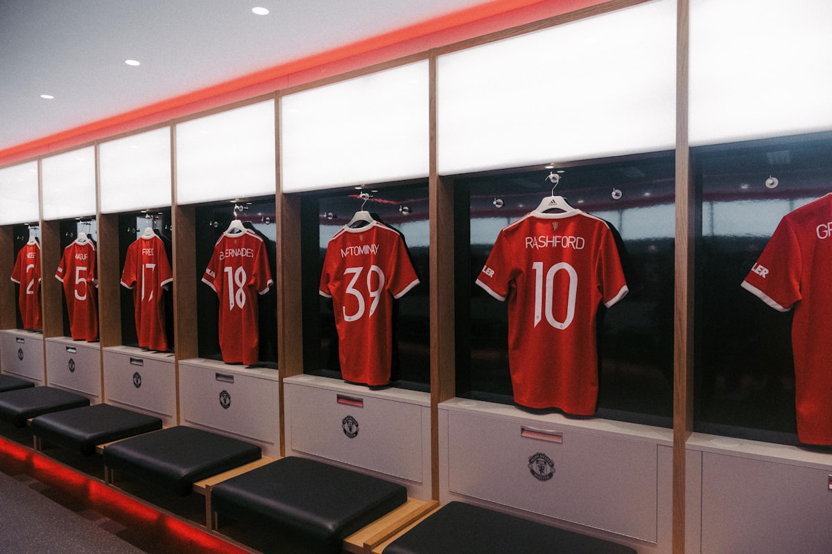 a row of lockers with jerseys on them related to Elevate Your Soccer Room with Stylish Curtain Valances