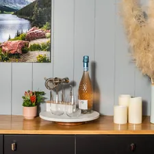 A rustic wooden countertop adorned with wine essentials. related to Black Sideboard Buffet Ideas