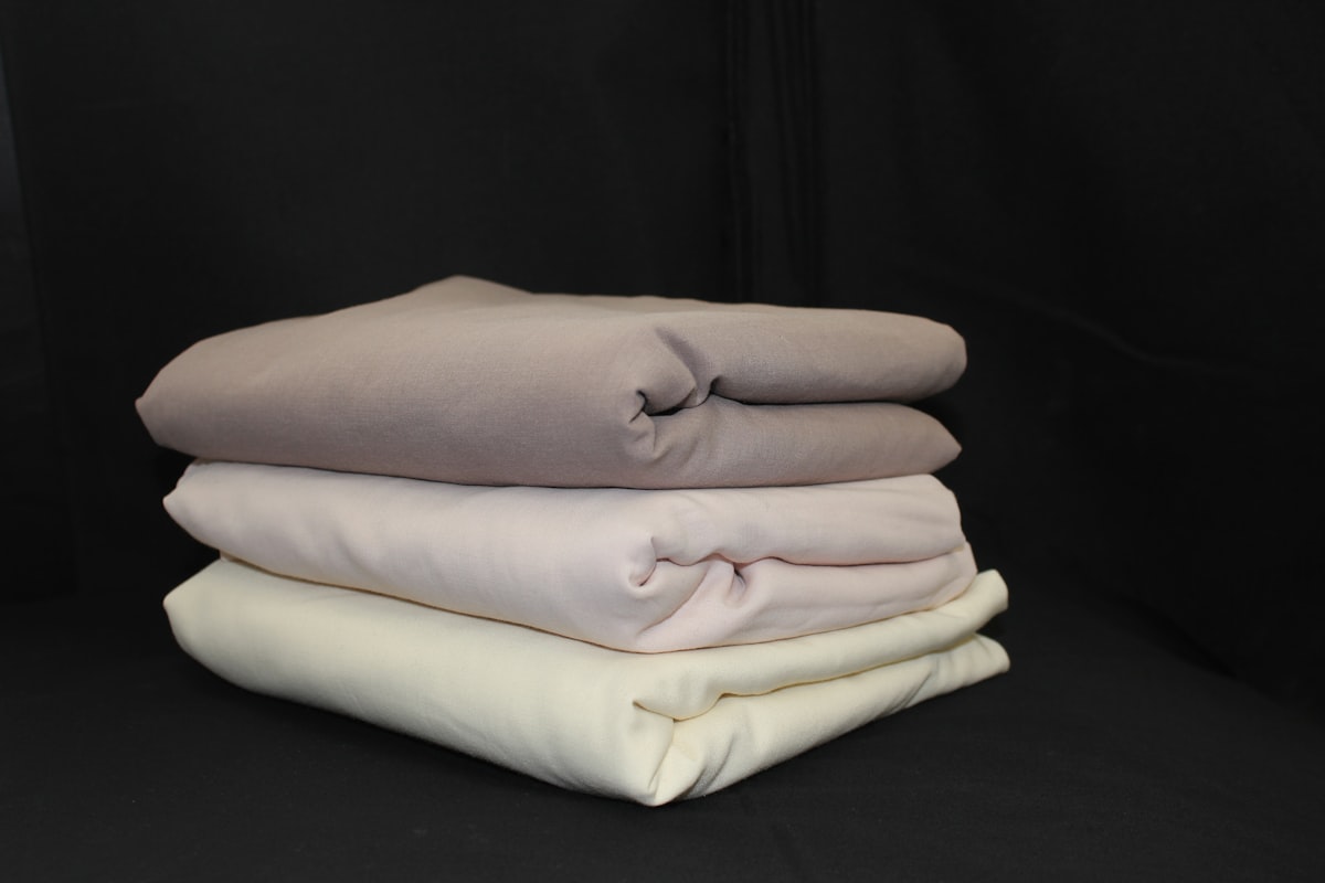a sculpture of a person's face related to Queen Size Coverlets