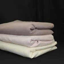 a sculpture of a person's face related to Queen Size Coverlets