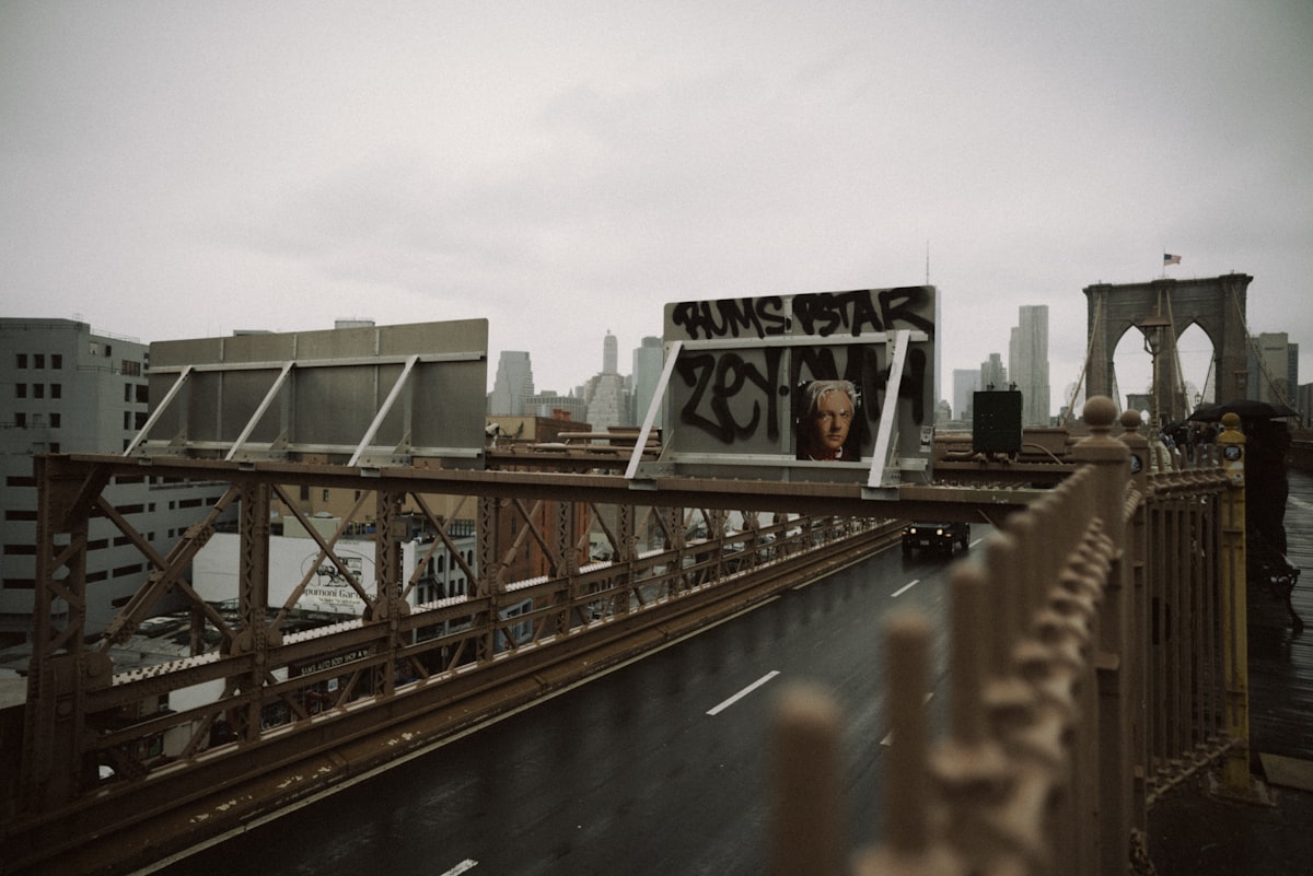 a sign on the side of a bridge that reads king of the road related to Top Bed Frames in New York City