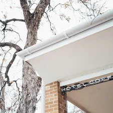 a sign that is on the side of a building related to Exploring the Best Bed and Breakfasts in Austin, TX