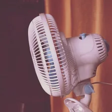 A small mini clipper fan on the table. related to Why the Bed Bath and Beyond Fan is a Must-Have for Your Home