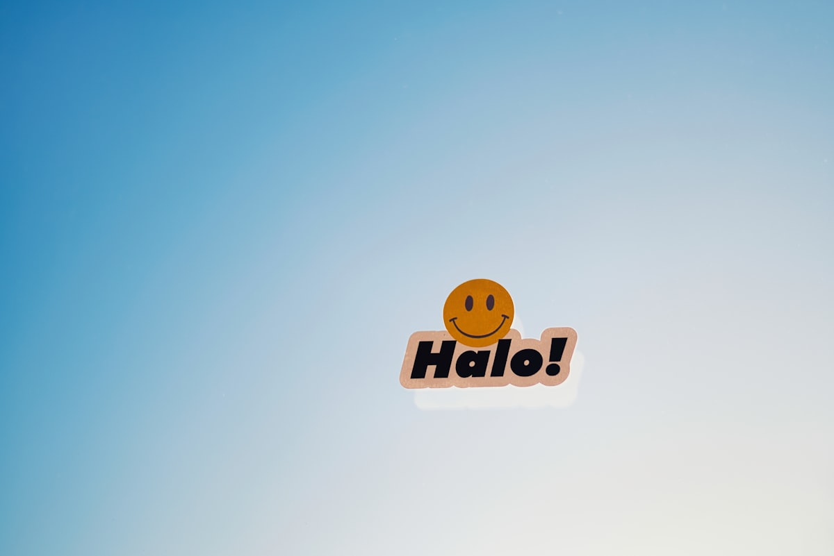A smiley face with the word "halo!" related to The Ultimate Guide to Halo Dog Beds
