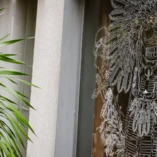a statue of a skeleton related to Crochet Curtain Valance
