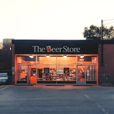 a store front with a parking lot related to Slumber in Style: Your Guide to the Best Bed Stores Near You