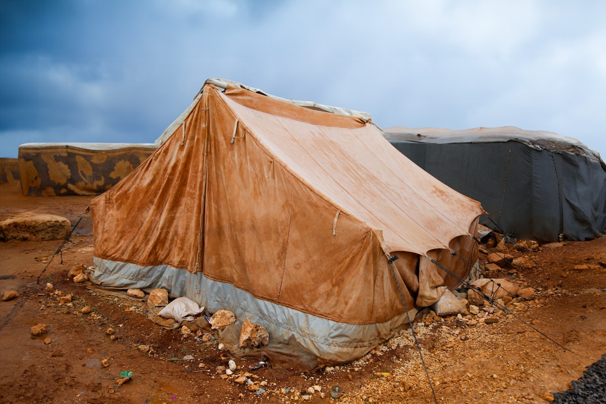 A tent sitting on top of a dirt field related to The Ultimate Guide to Choosing the Right Bed Bug Tent