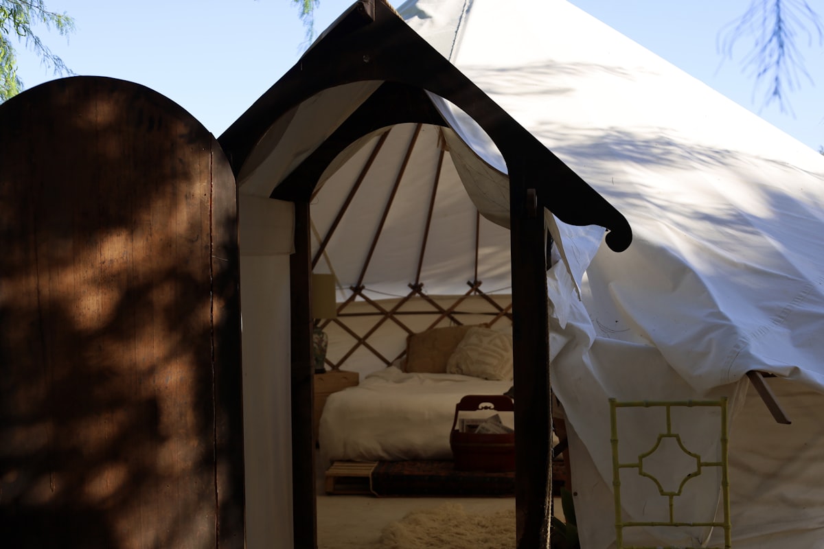 a tent with a bed inside of it related to Elevate Your Camping Experience with the Ultimate Canopy Tent Bed