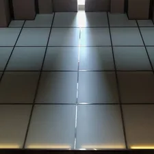 a tiled floor with a light coming through the middle of it related to Transform Your Sleep: The Benefits of a LED Bed Frame