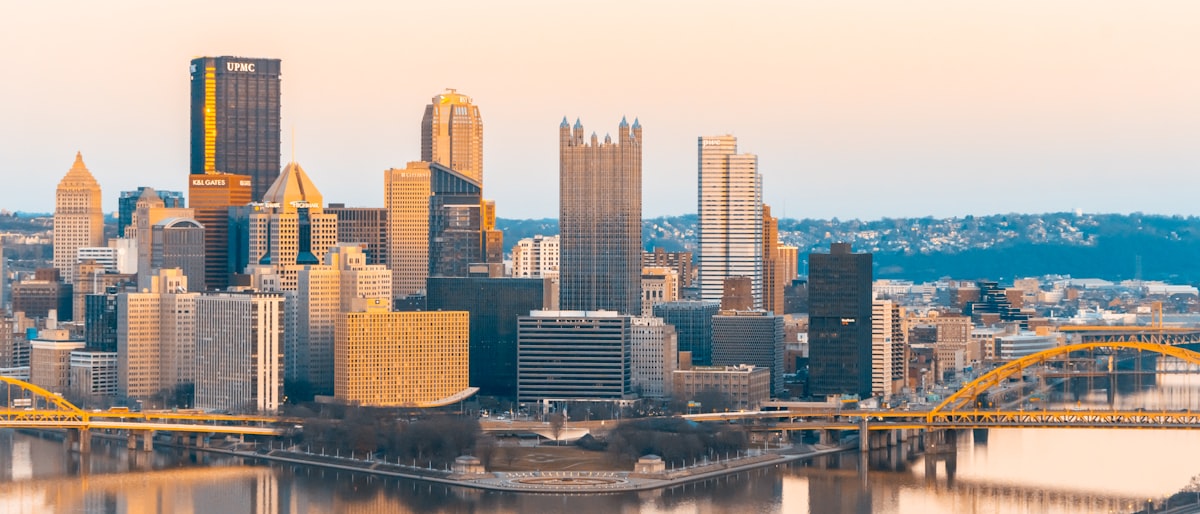A view of a city with a bridge in the foreground related to Transform Your Bedroom with Pittsburgh Pirates Bedding