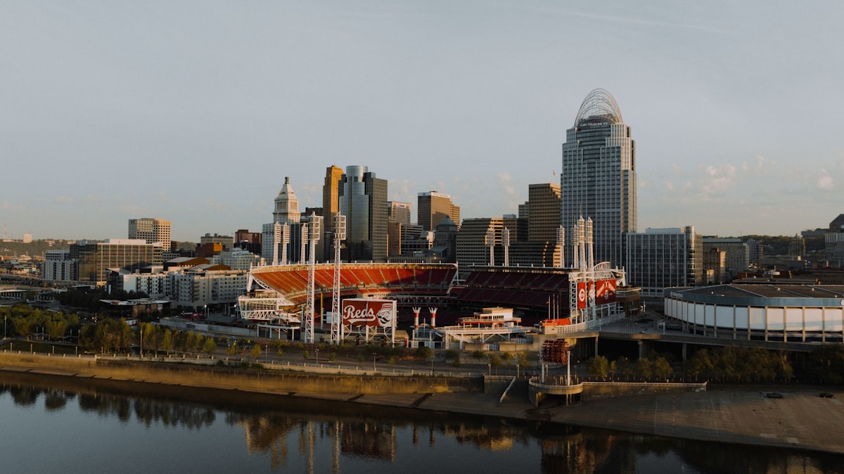 a view of a city with a river running through it related to Score Big with Cincinnati Reds Bedding: A Home Run for Your Bedroom