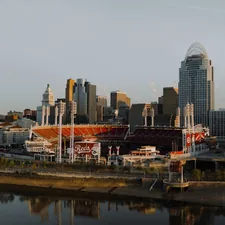 a view of a city with a river running through it related to Score Big with Cincinnati Reds Bedding: A Home Run for Your Bedroom