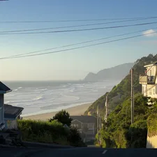 A view of the ocean from a hill side house related to A Cozy Retreat at Trinidad Bay Bed & Breakfast: Your Perfect Coastal Escape