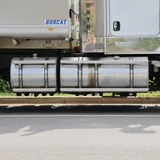 A white semi truck parked on the side of the road related to Maximizing Efficiency with Steel Flatbed Truck Beds