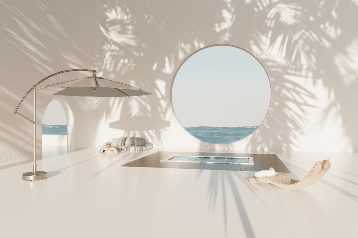 A white table with a mirror and umbrella on it related to Explore the Best Tanning Bed Options for Your Home