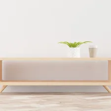 a white vase with a green plant on top of it related to Elevate Your Home Decor with Sideboard Buffet Furniture