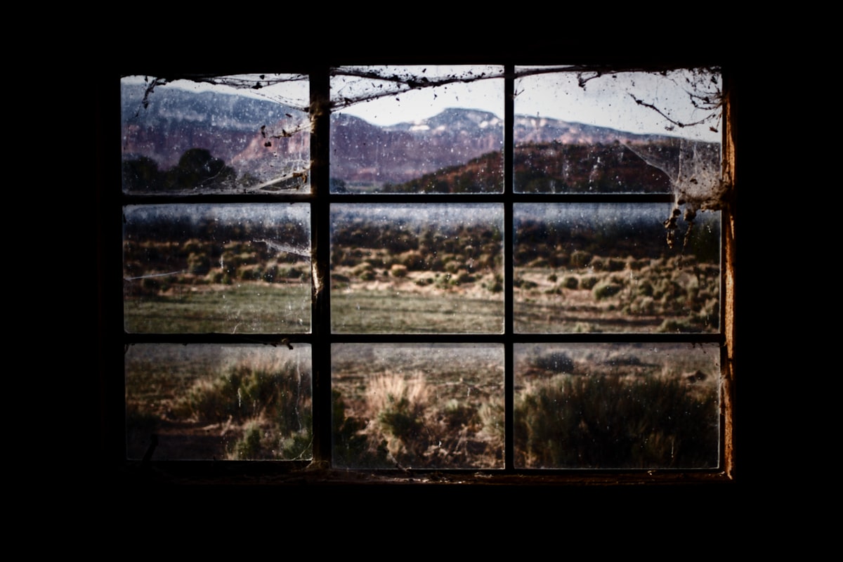 a window with a view of a mountain range related to The Art of Window Valances: Exploring Cornice Window Valance Options