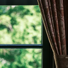 a window with curtains related to Elevate Your Windows with Curtain Swags and Valances
