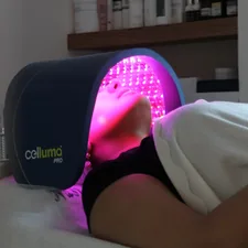 A woman laying on a bed with her head on a pillow related to The Ultimate Guide to Home Tanning Beds