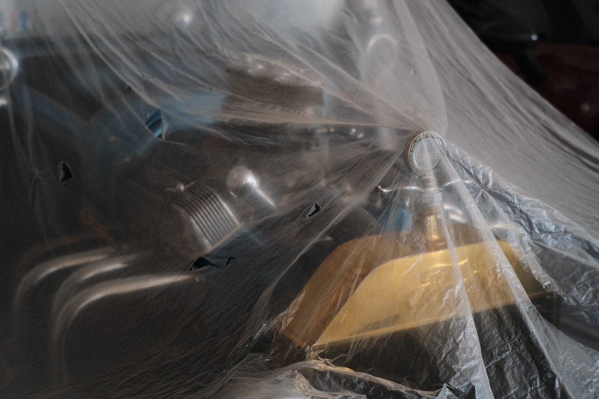 a yellow and black object wrapped in plastic related to Spray Bed Liner Cost: A Comprehensive Guide to Saving Money