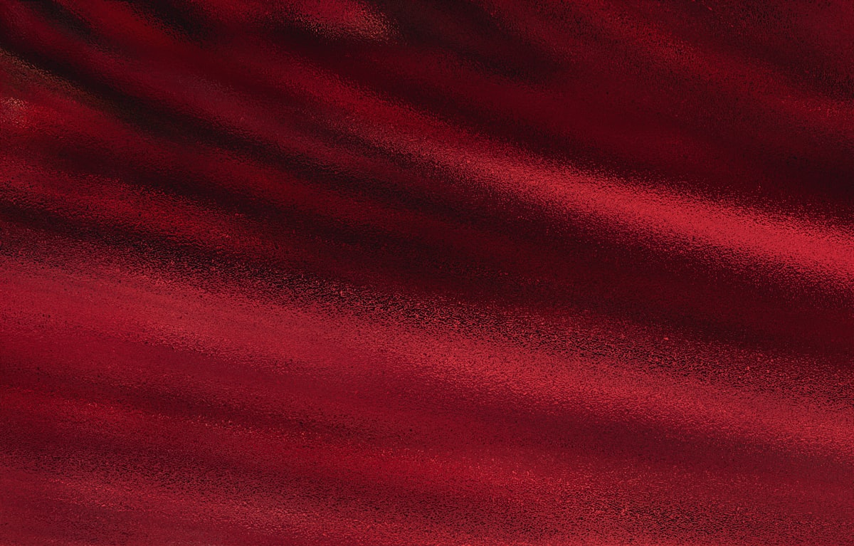 Abstract swirling red and black patterns related to Burgundy Window Valance