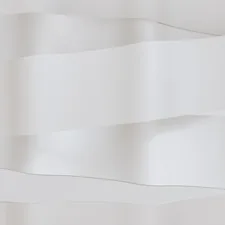 Abstract white folds create a minimalist design. related to Envisioning Elegance: The Allure of a White Bed Canopy