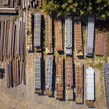 Aerial view of a concrete manufacturing facility. related to Maximizing Efficiency with Steel Flatbed Truck Beds
