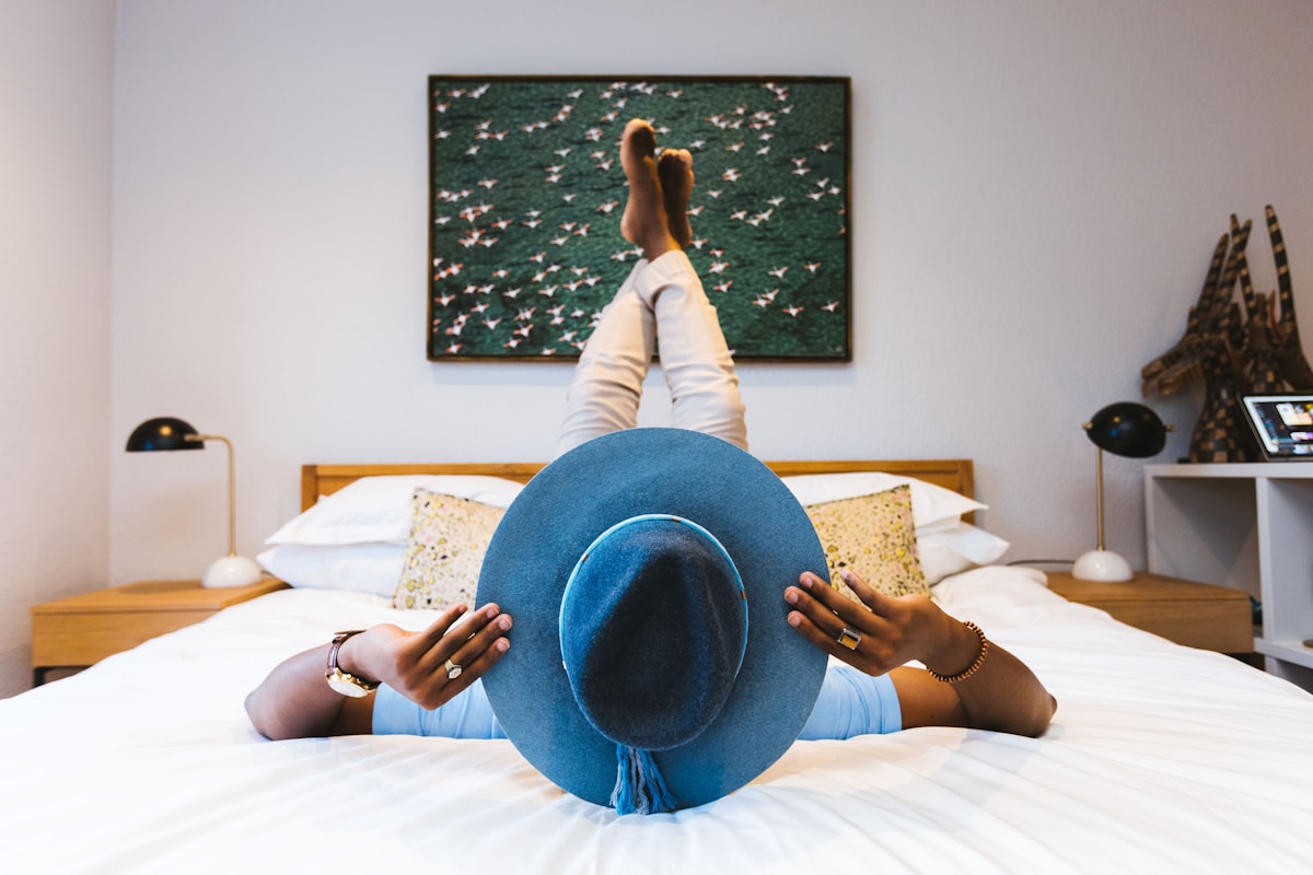 African man posing with a fancy watch and blue hat. related to A Haven for Home Essentials in South Portland, Maine