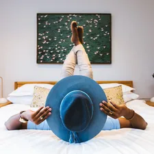 African man posing with a fancy watch and blue hat. related to A Haven for Home Essentials in South Portland, Maine