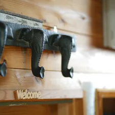 An elephant face hanger with welcome sign below related to Elevate Your Entryway with Style: The Ultimate Guide to Entryway Coat Hooks