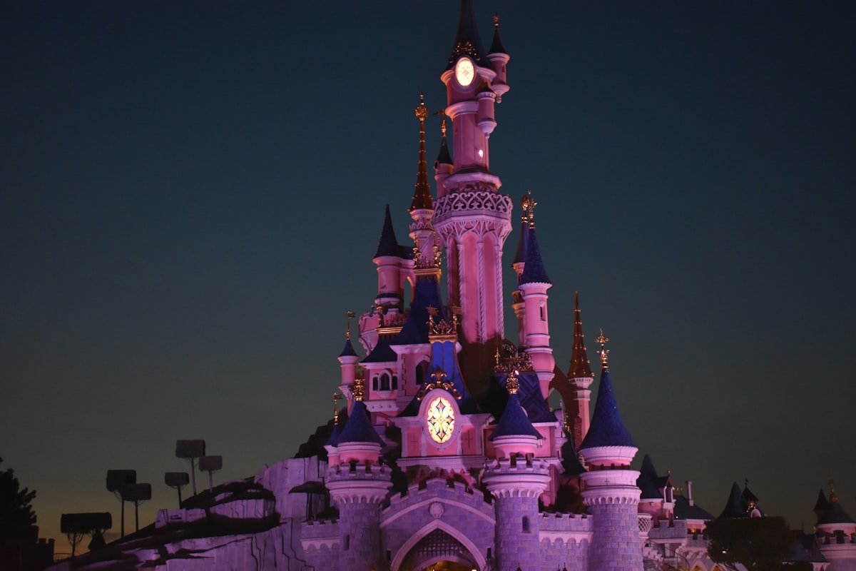 architectural photography of white and blue castle related to Dreaming of Royalty: The Allure of Princess Castle Beds