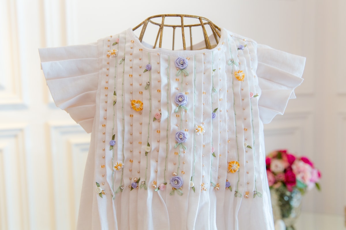Beautiful girl dress for special occasions related to The Chic Touch: Lombardi Smocked Coverlet Decorating Ideas