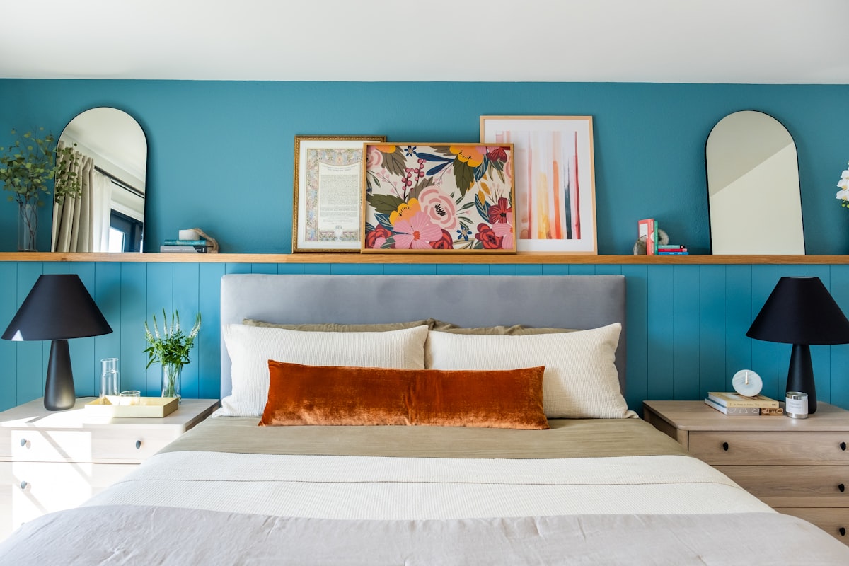 Bedroom bathed in soft sunlight through a large window and two sleek lamps on nightstands provide a gentle ambiance, perfect for relaxation and peaceful sleep! related to Complement Your Bedroom Decor with Valances, Bed Bath and Beyond