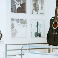 black acoustic guitar related to Transform Your Bedroom with Music-Themed Bedding: Top Ideas for Music Lovers