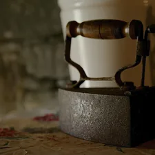 black and gray metal machine part related to The Warmth of the Past: Uncovering the Charm of Antique Bed Warmers