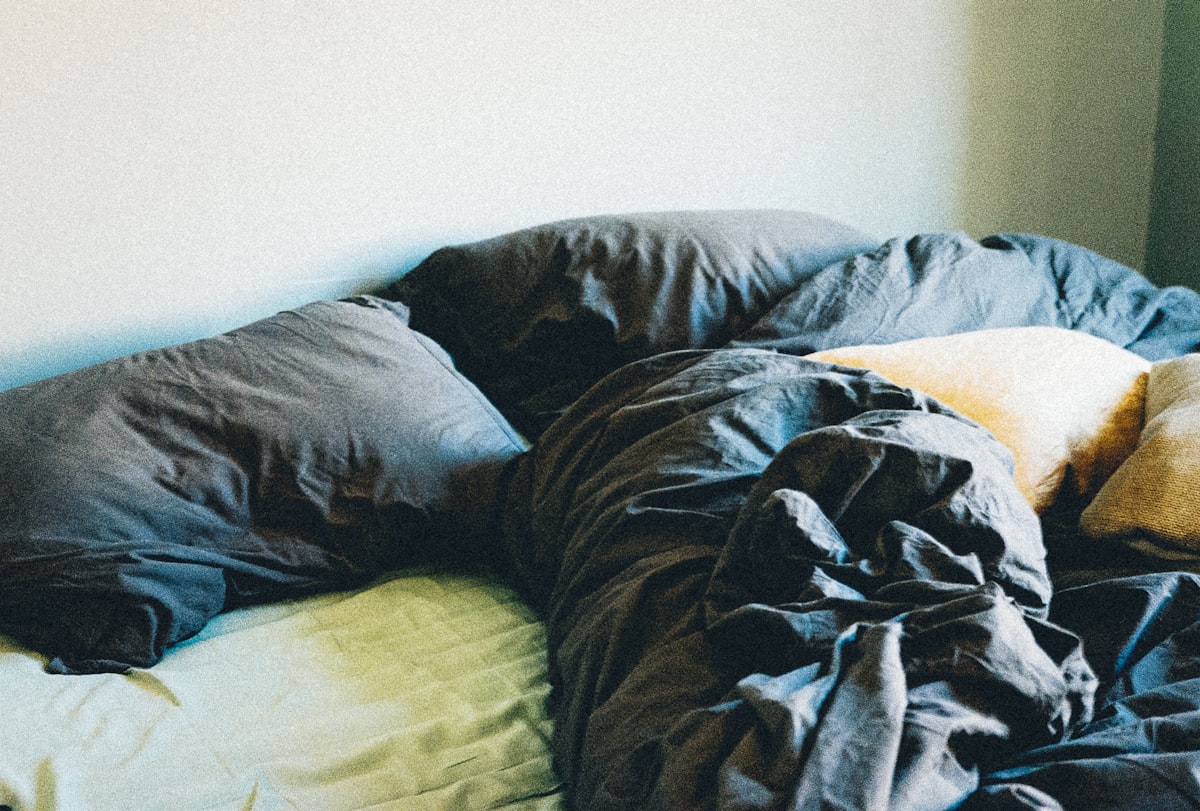 black and white blanket on bed related to Oversized King Coverlets: Ultimate Sleeping Comfort