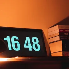 black digital clock reading at 16 48 related to Understanding the Financial Aspects of Sleep Number Beds