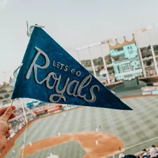 blue and white Lets Go Royal pennant related to Transform Your Bedroom with Kansas City Royals Bedding: A Home Run for Fans
