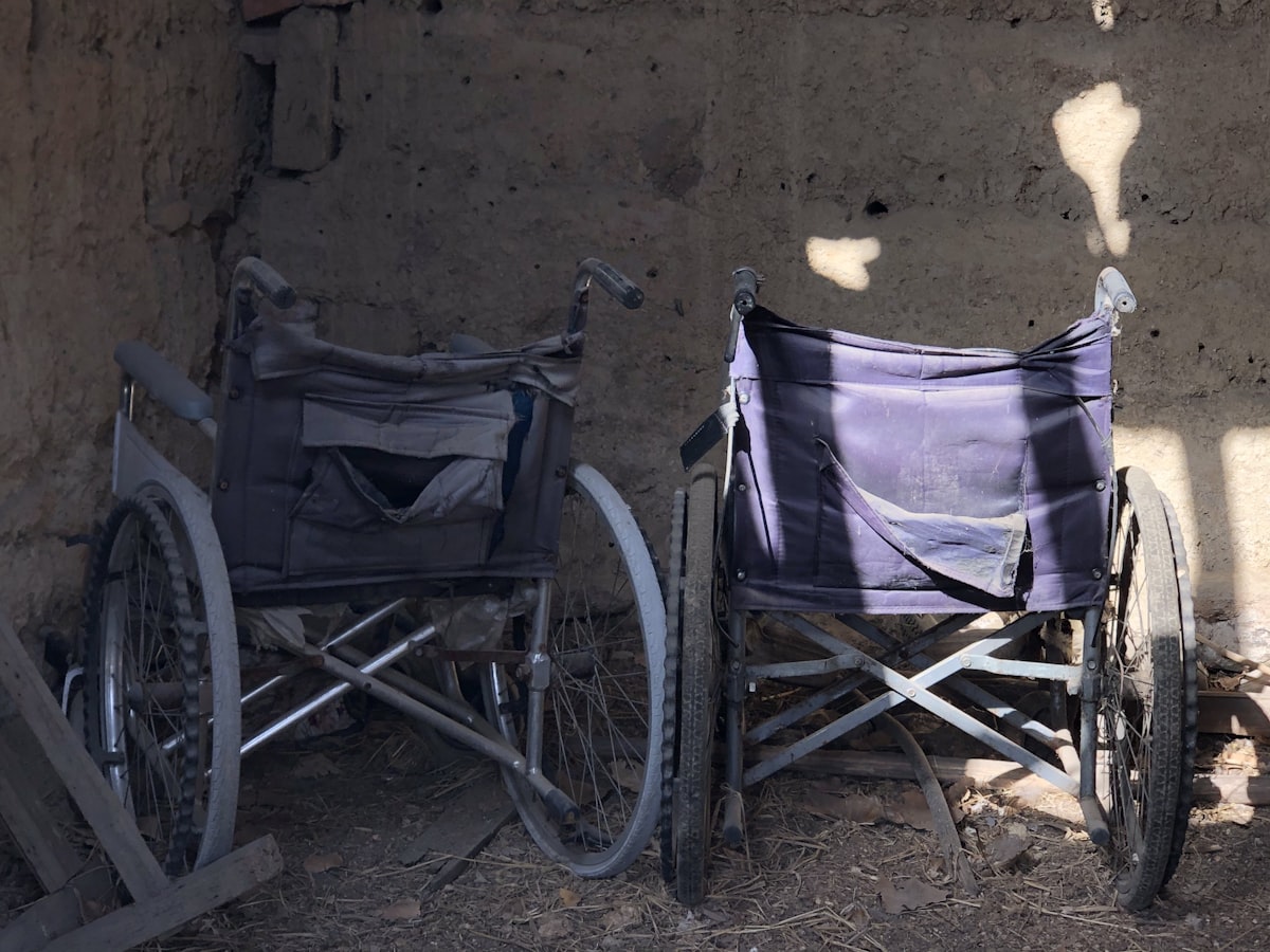 blue and white stroller on brown sand related to Chairs That Convert to Beds: The Ultimate Space-Saving Solution