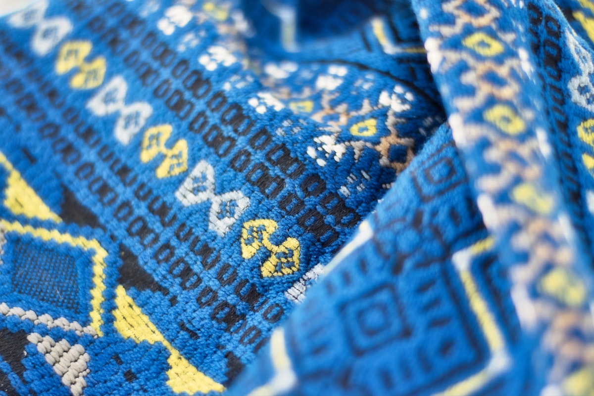 blue, brown, and pink apparel related to Embracing the Ancient: Aztec Print Bedding for a Bold Bedroom