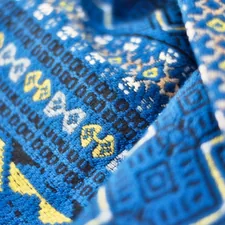 blue, brown, and pink apparel related to Embracing the Ancient: Aztec Print Bedding for a Bold Bedroom