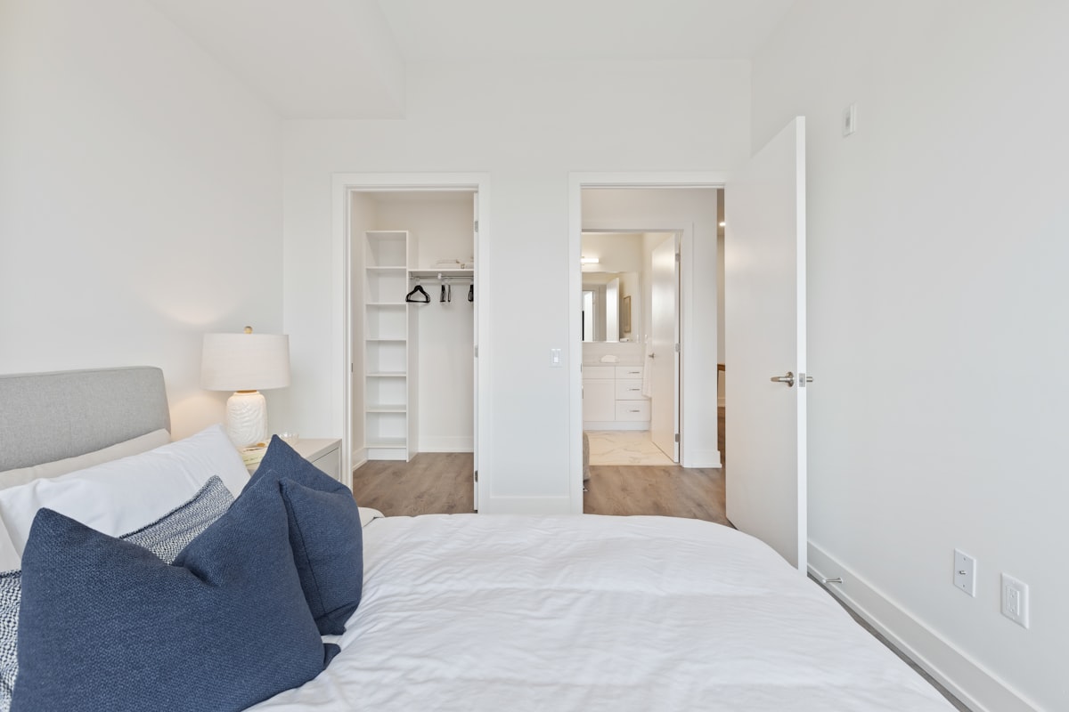blue textile on white bed related to Spacious 3 Bed 3 Bath Rentals: Your Dream Home Awaits