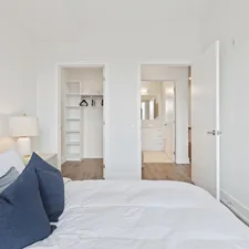 blue textile on white bed related to Spacious 3 Bed 3 Bath Rentals: Your Dream Home Awaits