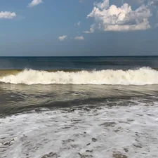 body of water during daytime related to Discover the Charm of Rehoboth Beach Bed and Breakfasts