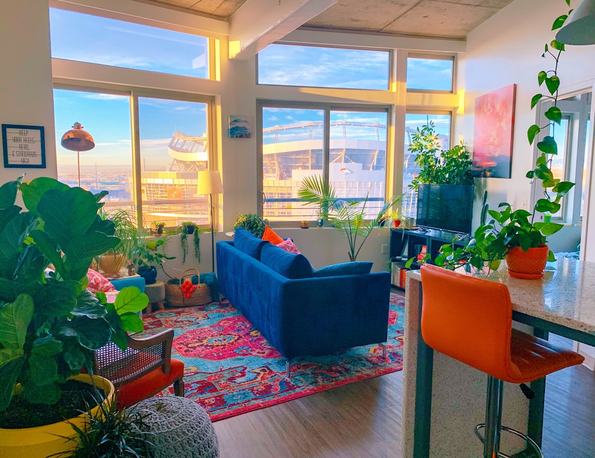 Boho home decor in a Denver apartment next to Mile High Stadium related to Enhancing Your Space with the Vibrant Flair of Orange Curtain Valances